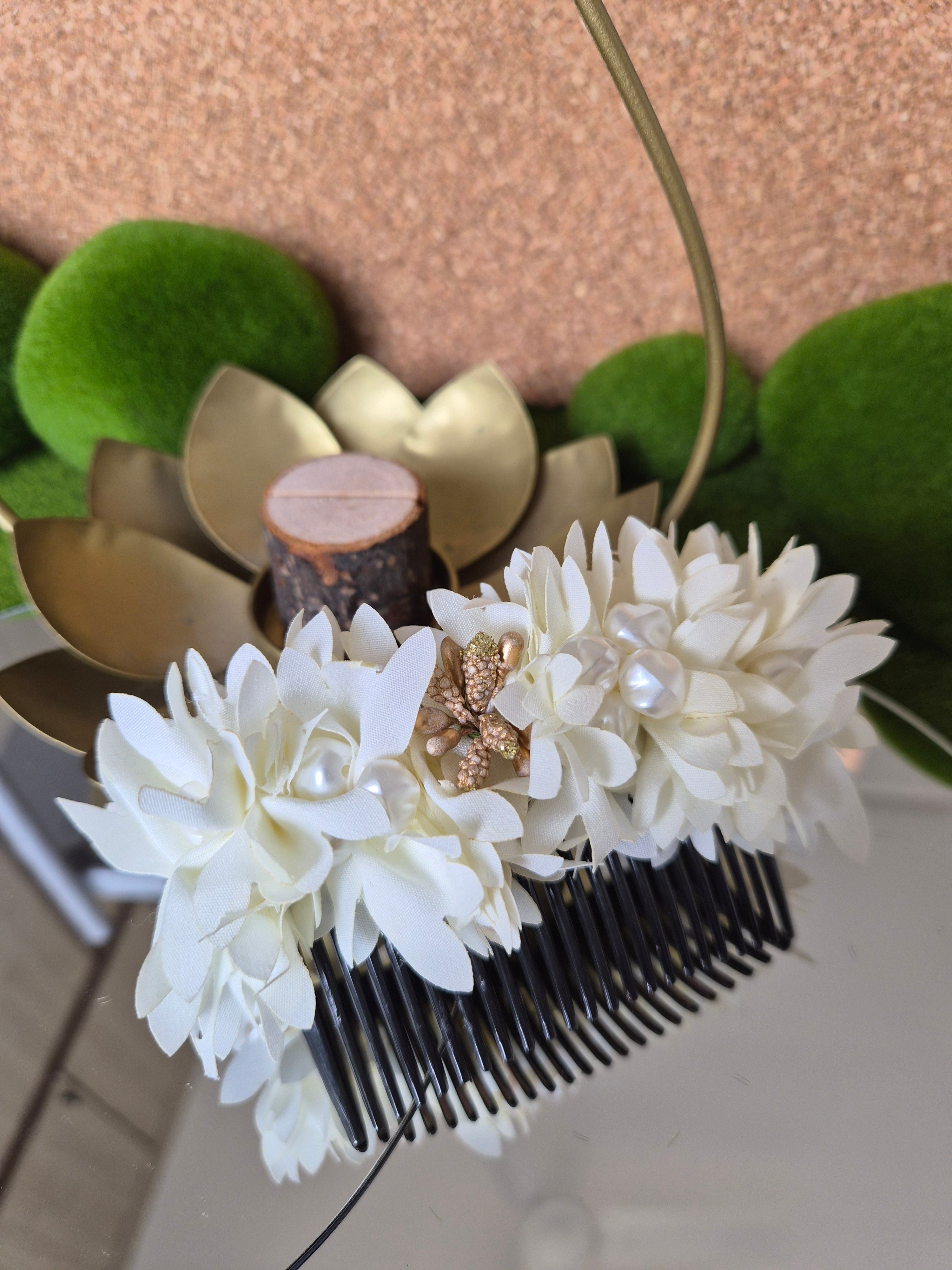 White and gold hair comb